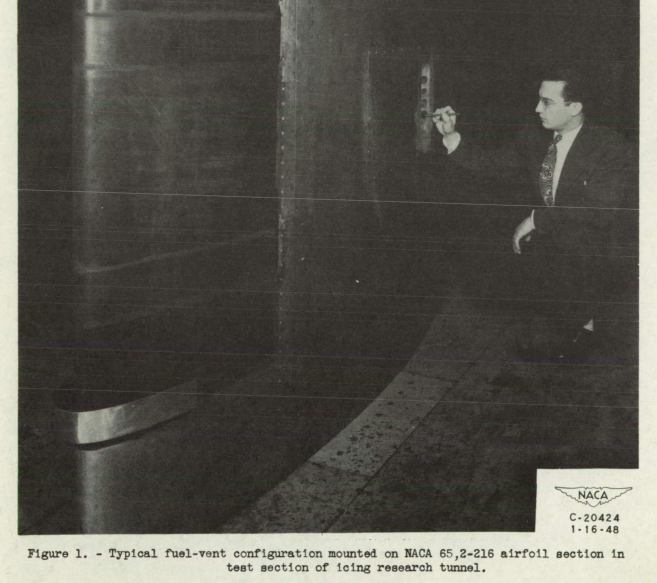 Figure 1. Typical fuel-vent configuration mounted on NACA 65,2-216 airfoil section in
test section of icing research tunnel.
